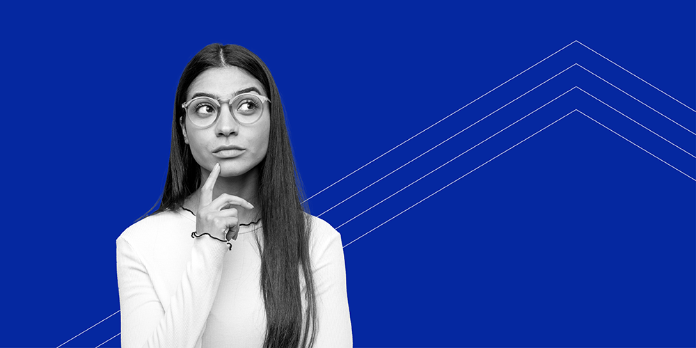 young woman with long hair and glasses wondering do no credit check loans show up on your credit report?