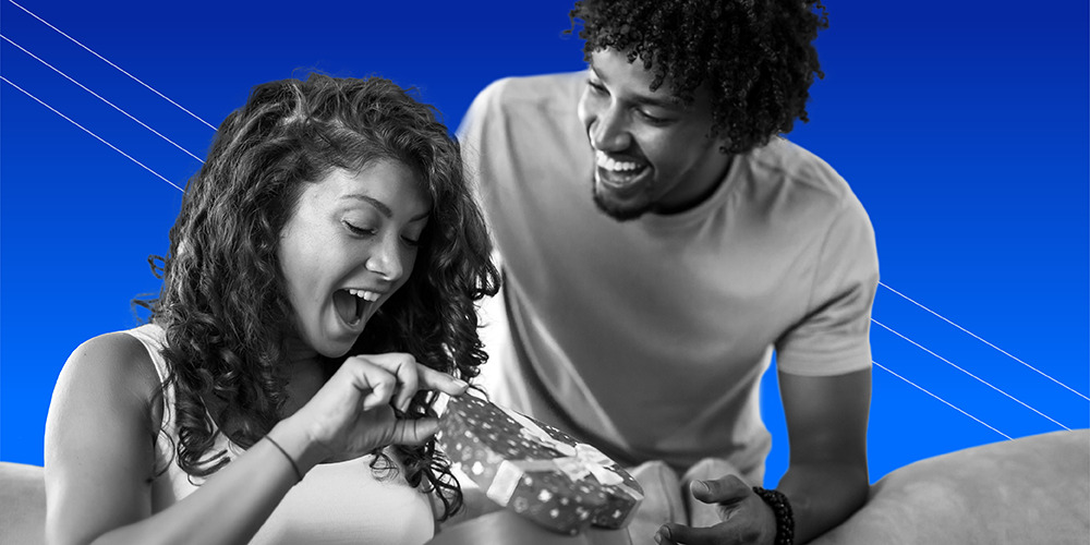 young woman opening a valentine's day gift