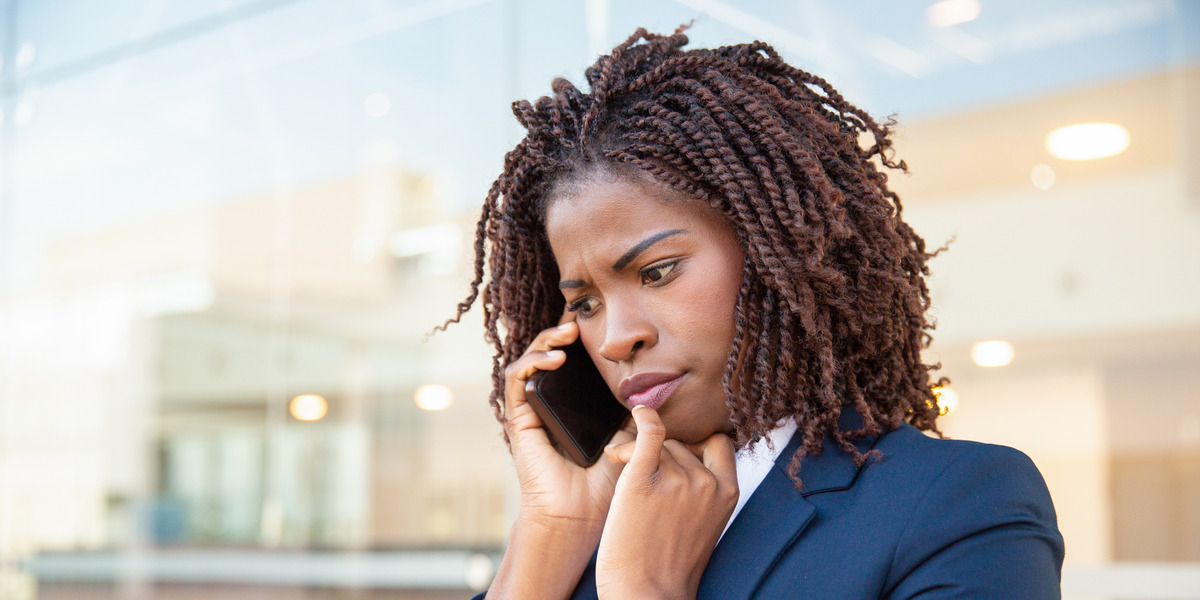 concerned woman on phone