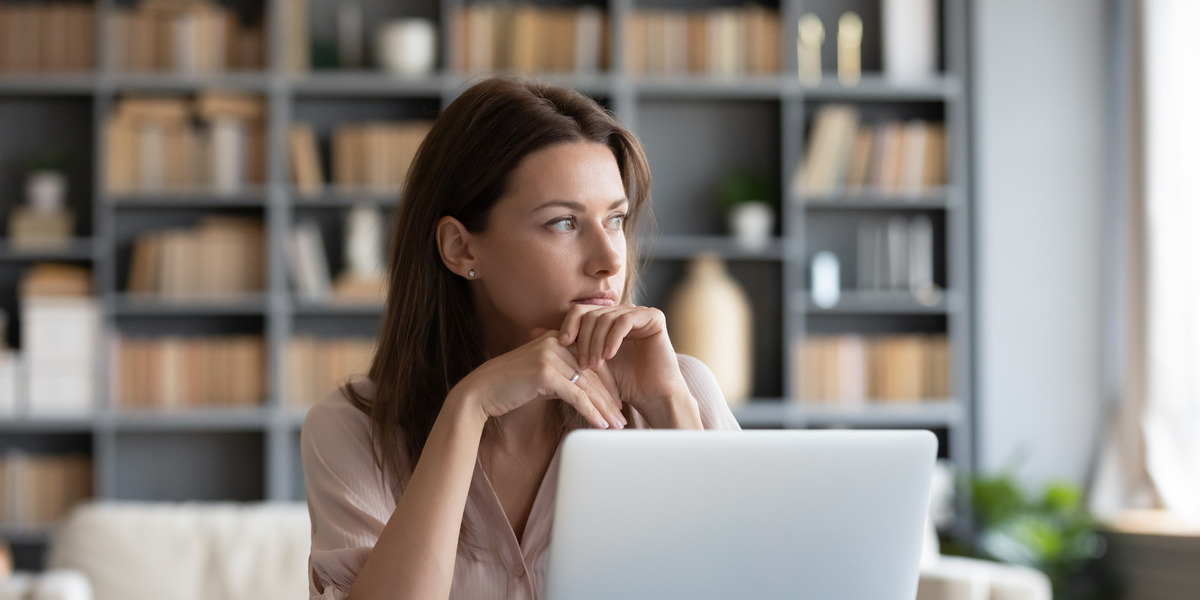 woman sitting by computer